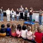 UConn Jumpstart members speaking to group of preschool children from UConn Child Labs.